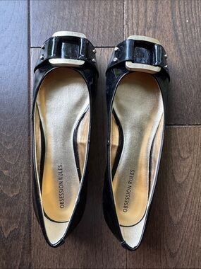 Obsession Rules Black Patent leather Flats with Gold Accent Buckles, size 6M